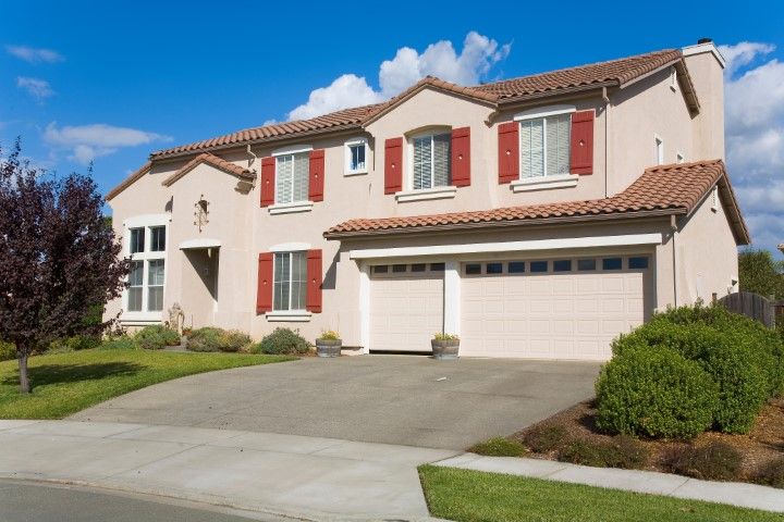 a house with a two driveway car
