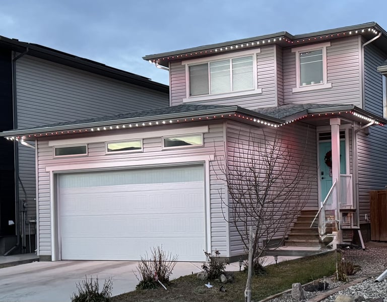 Beautiful permanent holiday lighting installed by MY-LITES certified dealers on a home exterior. 