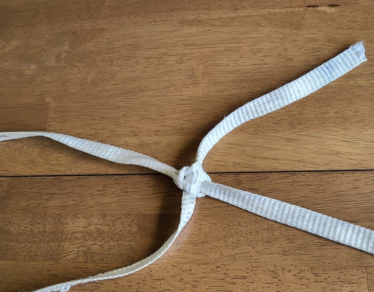 Zeppelin Bend joining two pieces of 2500 pound Mule Tape for a wire pull.