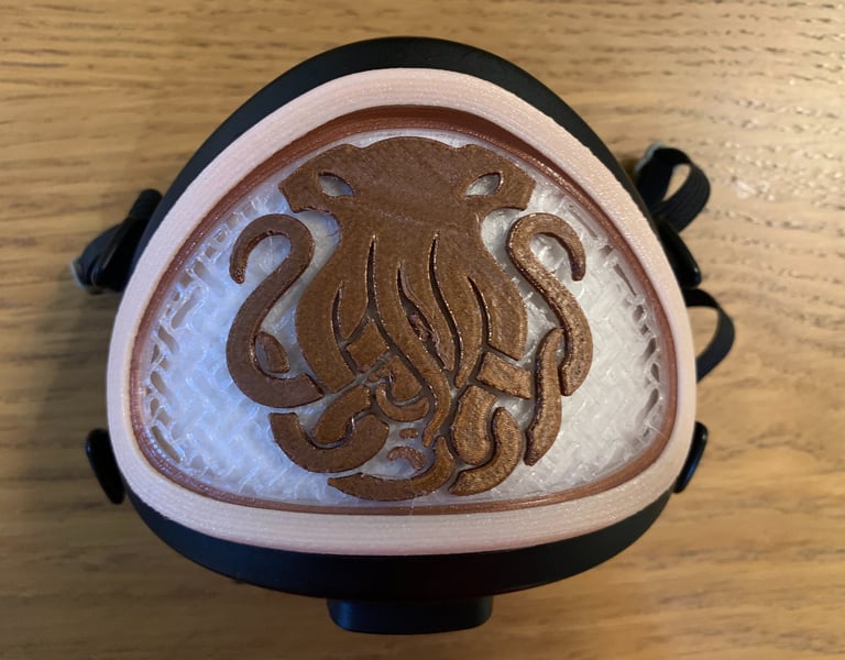 flo-32: Flomask with closed InkFish logo decoration