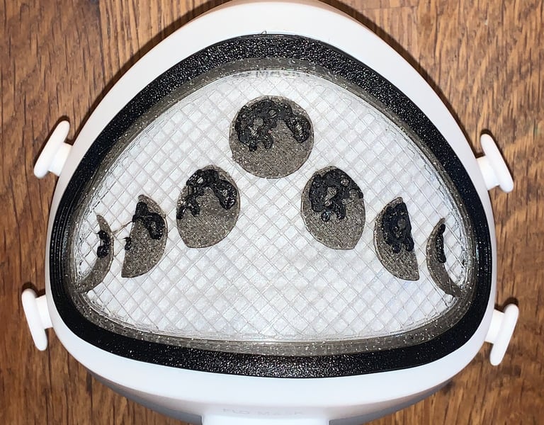 flo-31: Flomask with Moon-faces decoration