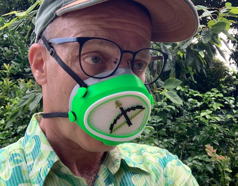 flo-55: Fluo-green Flomask cover and Minecraft Bow decoration
