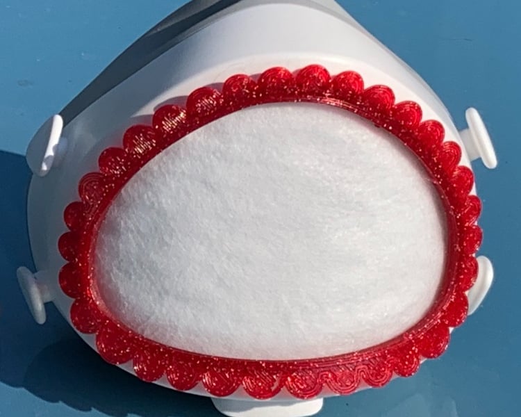 flo-61: Flomask with circles on the rim decoration