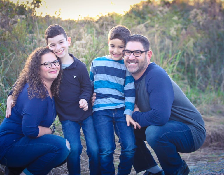 a family posing for a family photo