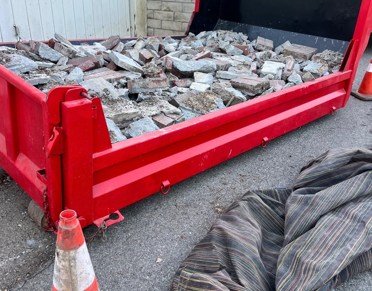 Our 5 ton dumpster filled with concrete. Please level fill only.