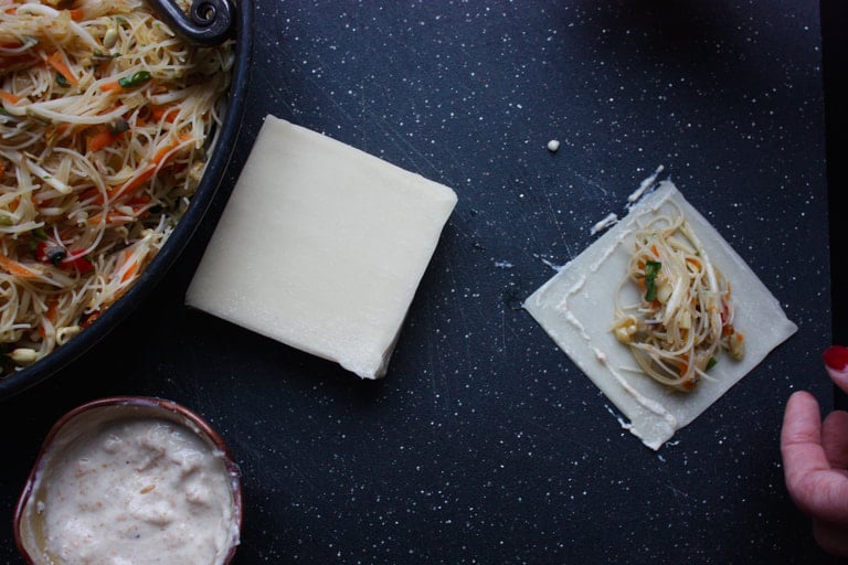 rolling Thai spring rolls