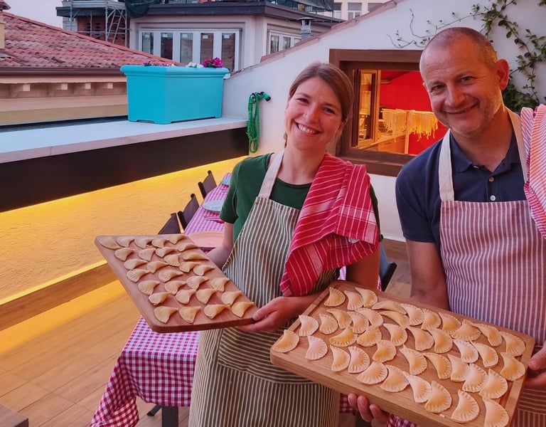 Hosts in cooking classes Verona