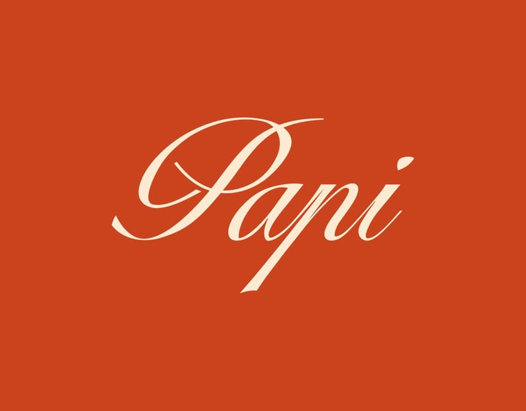 Papi Logo in Elegant white cursive Papi typography logo centered on a burnt orange background.