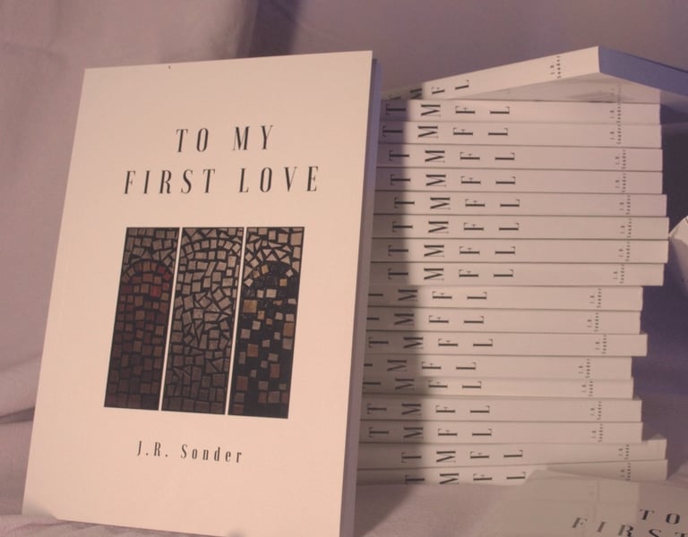 A stack of J.R. Sonder's poetry book, To My First Love (TMFL)