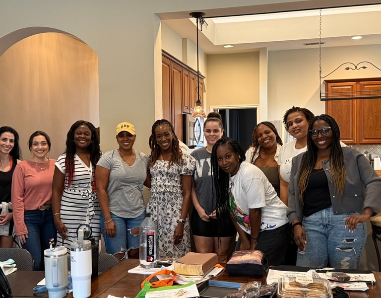 Women gathering in faith-based community Bible study in persons home