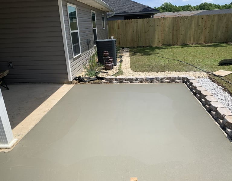 Concrete patio installation in Navarre FL for backyard outdoor living space