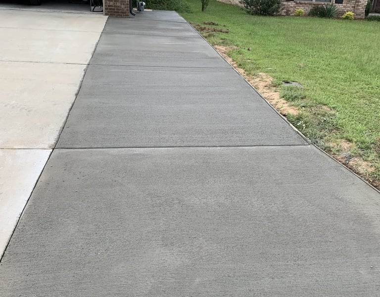 Residential concrete driveway in Navarre FL with durable, clean finish
