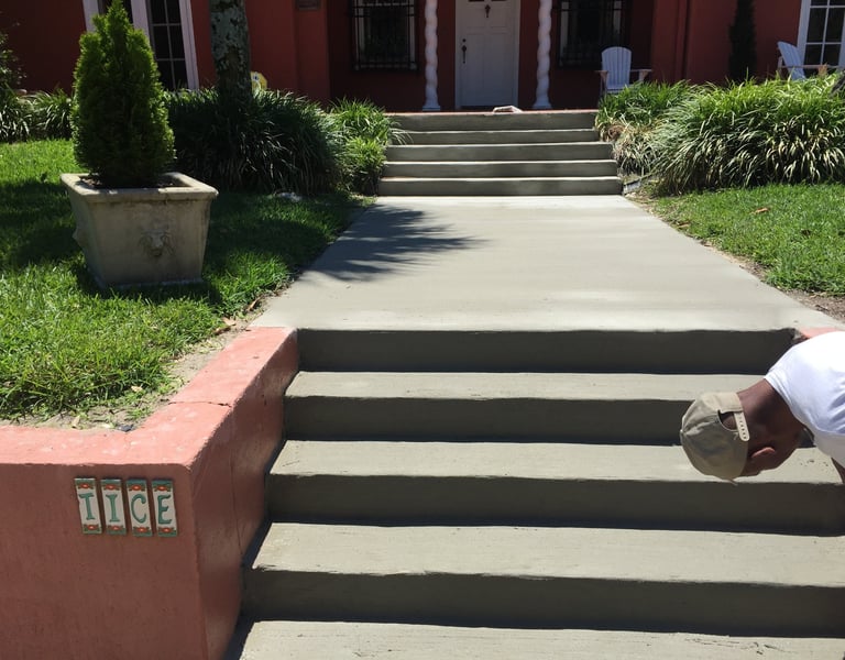 Concrete steps and porch installation in Navarre FL with detailed finishing work