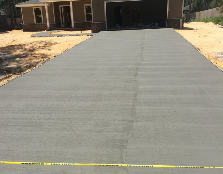 Concrete driveway installation in Navarre FL with smooth finish and clean edges