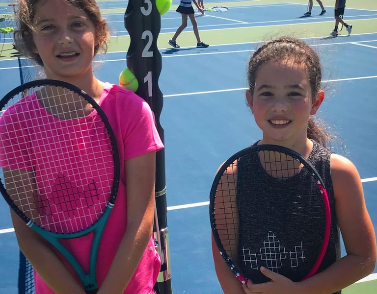 Junior tennis players enjoying league play in Panama City Beach, FL.  