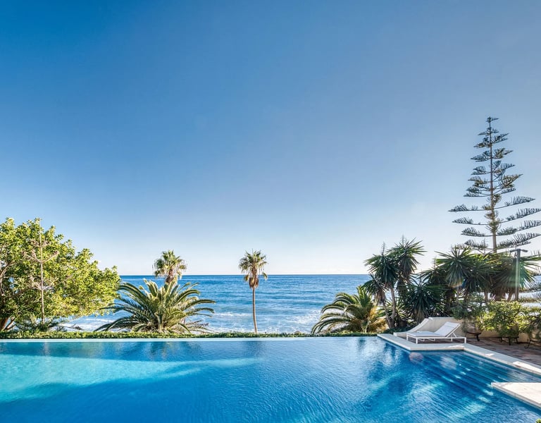 Infinity pool overlooking the Mediterranean with panoramic sea views