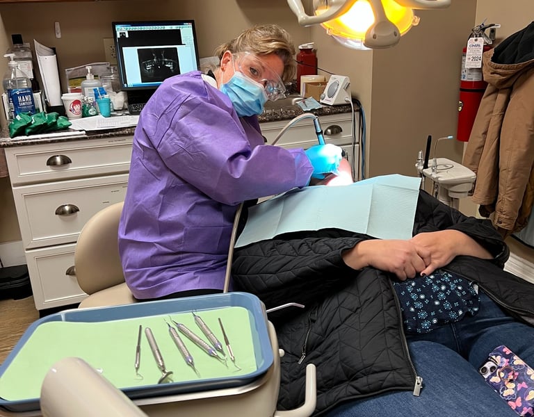 A patient receiving dental care at the center for hope and healing