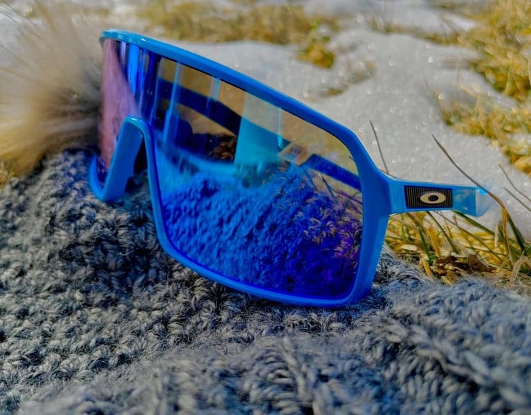 Oakley sports goggles sitting on a rock