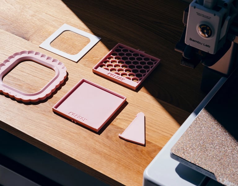 3D printable photo frame parts printing on desk, modular minimal frame design
