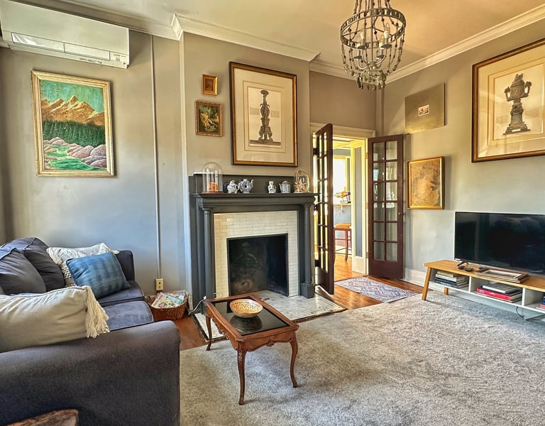 living room with couch and fireplace 2123 rivermont apartments