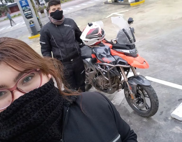 a woman in a black jacket and a man in a black jacket and a black