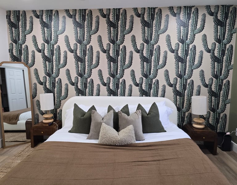 Scottsdale Airbnb interior with custom cactus wallpaper accent wall installation