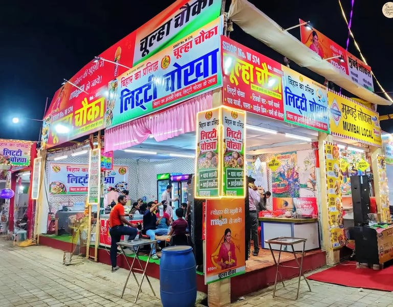Stalls serving diverse culinary delights from different Indian states at Kota Dussehra Mela.