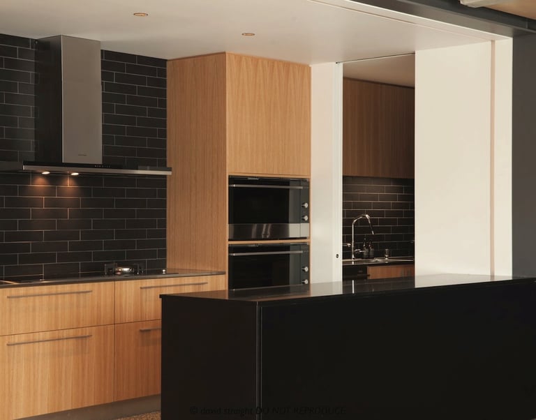 Architectural Kitchen by Qualitas Builders in Auckland