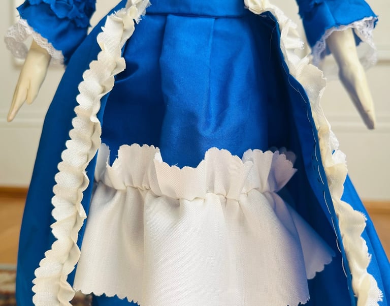 english wooden doll dressed as felicity