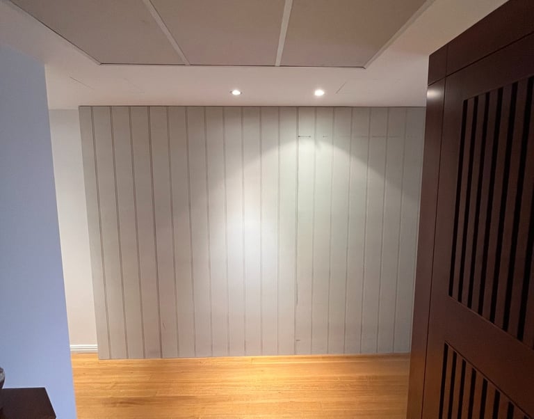Custom architectural wall build and timber panelling installation