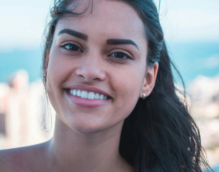 a woman with sunglasses and sunglasses on a sunny day