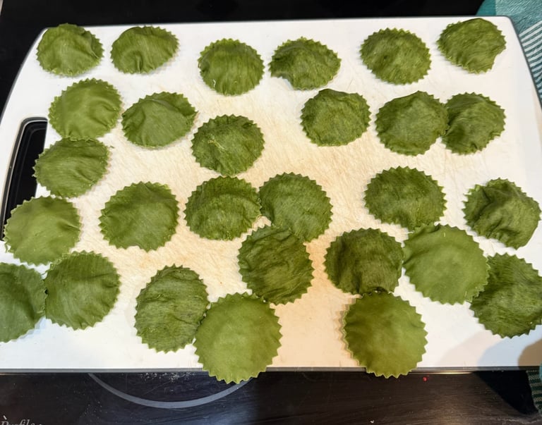 fresh handmade spinach ravioli before cooking