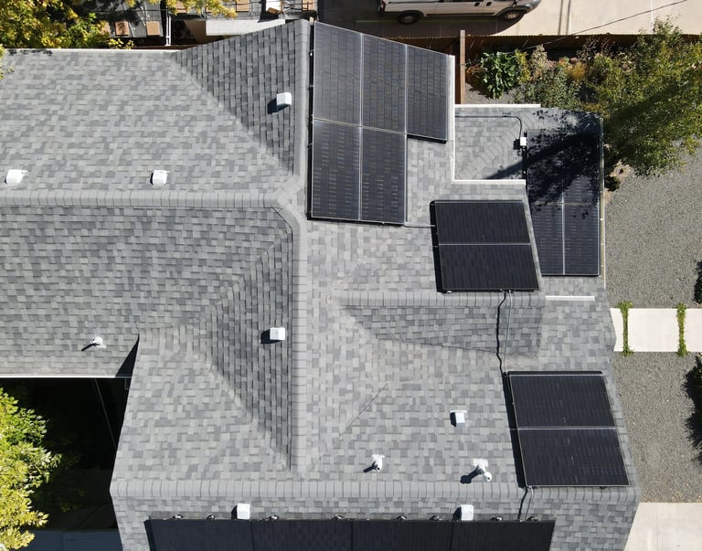 Image of a roof in Golden, CO, with solar panels.