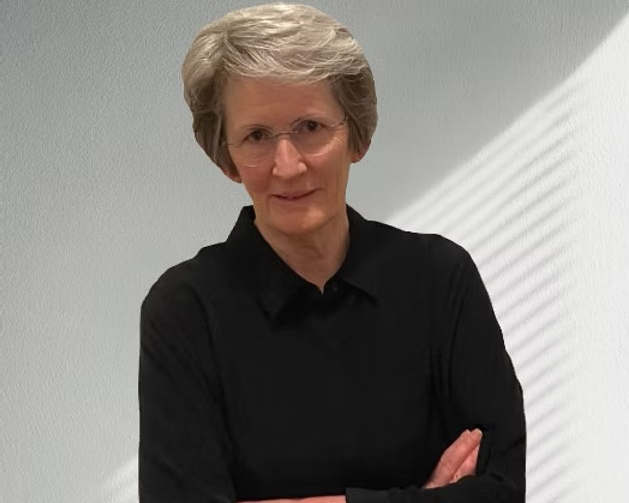 Image of the General Manager | Producer against a light gray wall