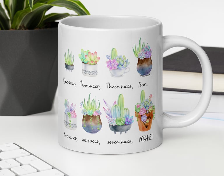 White succulent-themed ceramic mug with colorful plant illustrations — Miss Chatty Plants drinkware collection.