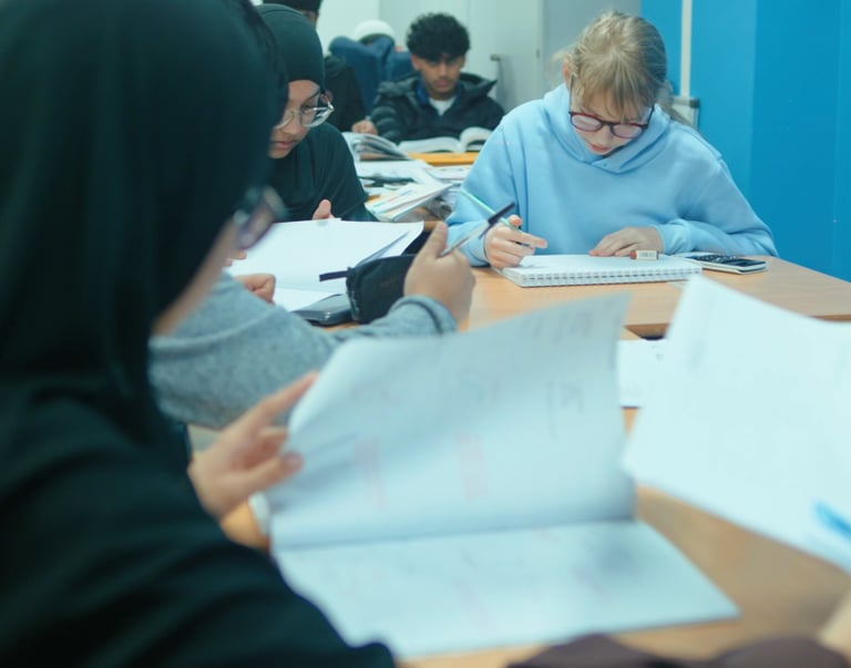 Students improving their English skills with expert tutors at Excel Tutors