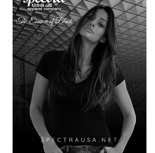 Woman wearing a Spectra USA black v-neck cotton t-shirt for a premium apparel company advertisement.