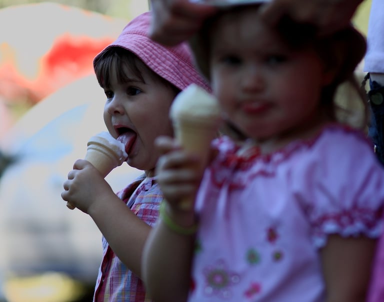 A child enjoying ZAKS Pud Pod's whippy ice cream at a ice cream van party hire