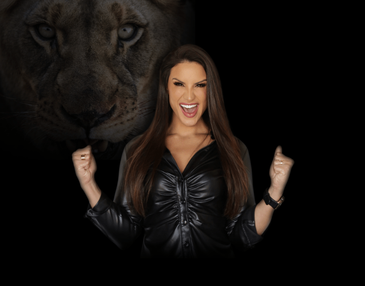 a woman in a black leather jacket and a lion