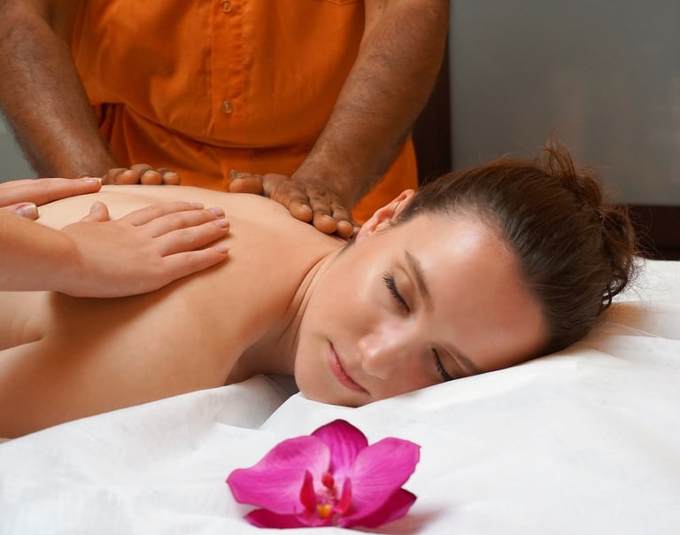 a woman getting a massage at a spa