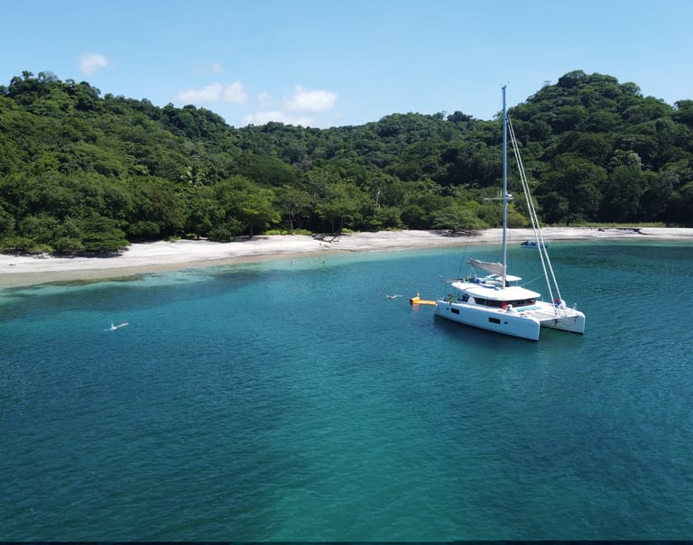 Kephas luxury catamaran anchored in pristine bay of Gulf of Papagayo, Guanacaste, Costa Rica