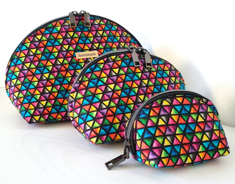 a pair of colorful bags with a triangle shaped design