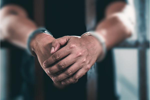 hands with handcuffs