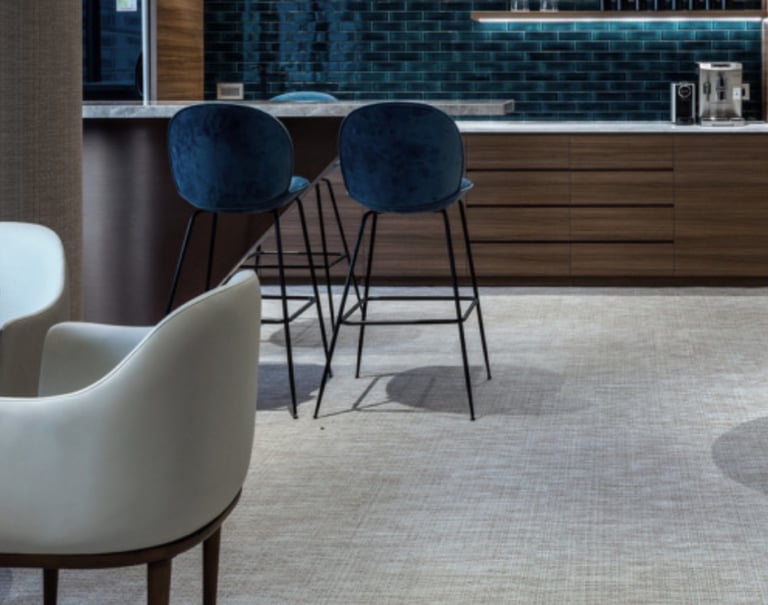 a modern looking bar with a bar stool and a bar stool