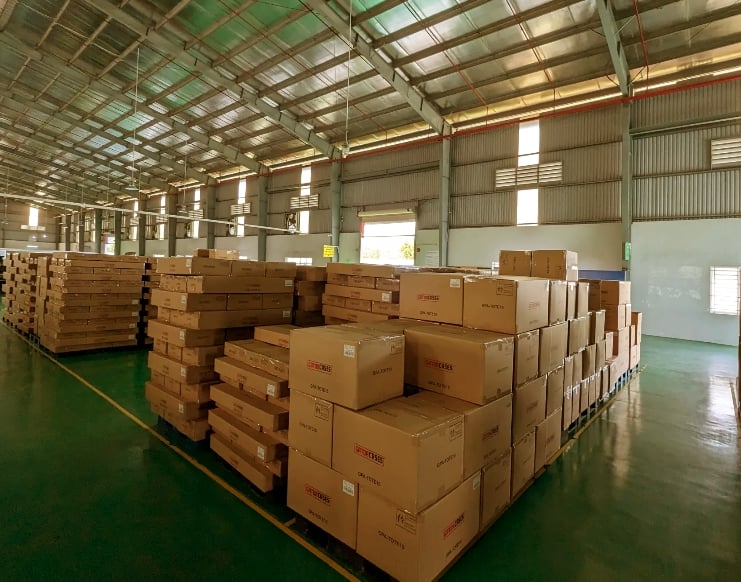 Finished goods warehouse with cartons ready for global shipping by King Fly.