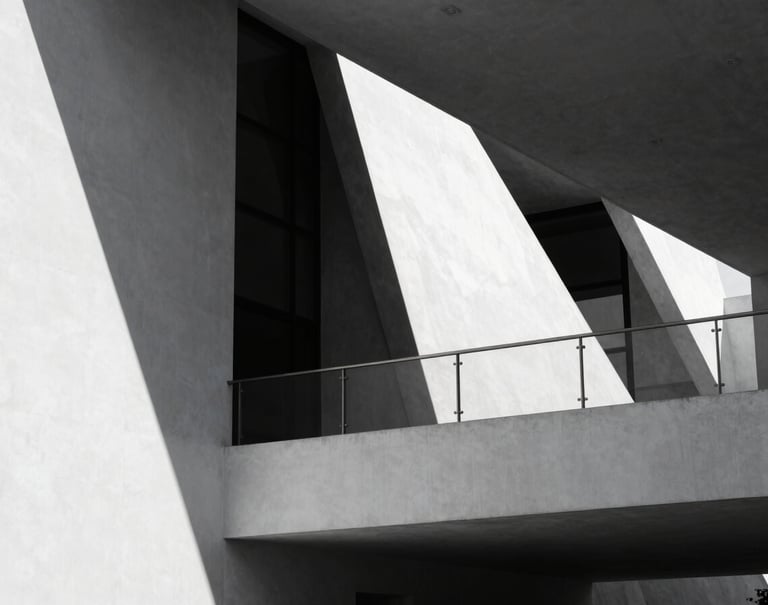 Abstract black and white architectural detail of a modern cultural center in Mexico. Strong play of light and shadow on white walls, reflecting a minimalist and contemporary aesthetic.