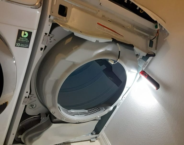 a dryer with front panel off