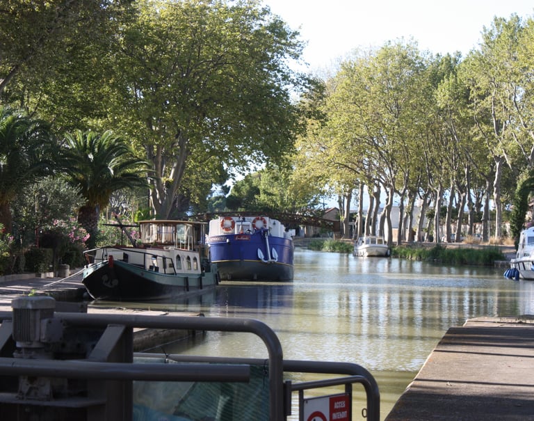 The Canal Du Midi, a beautiful canal with fishing and boat activities near Domaine Des Lucques