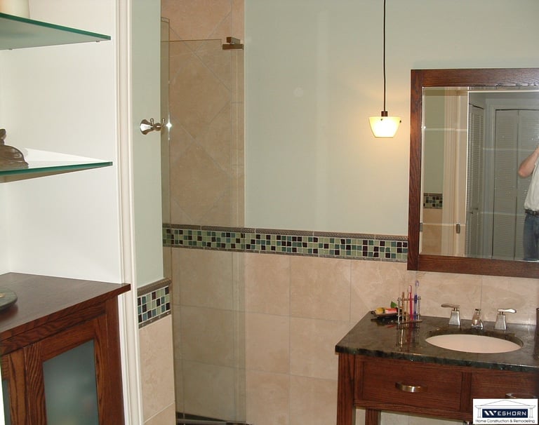 “Modern bathroom remodeled in Deer Park with walk-in shower and updated vanity by WESHORN