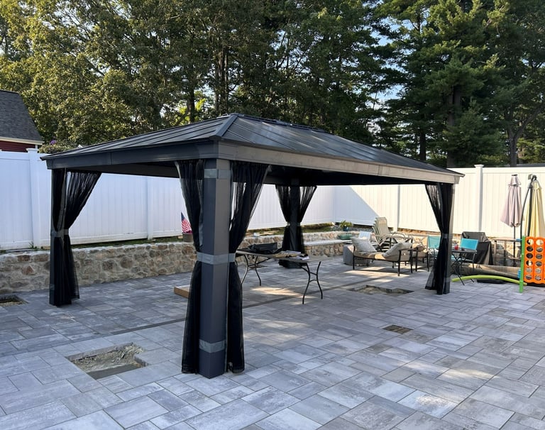 Fully assembled 14 x 20 Canopia gazebo with polycarbonate roof in Billerica, MA